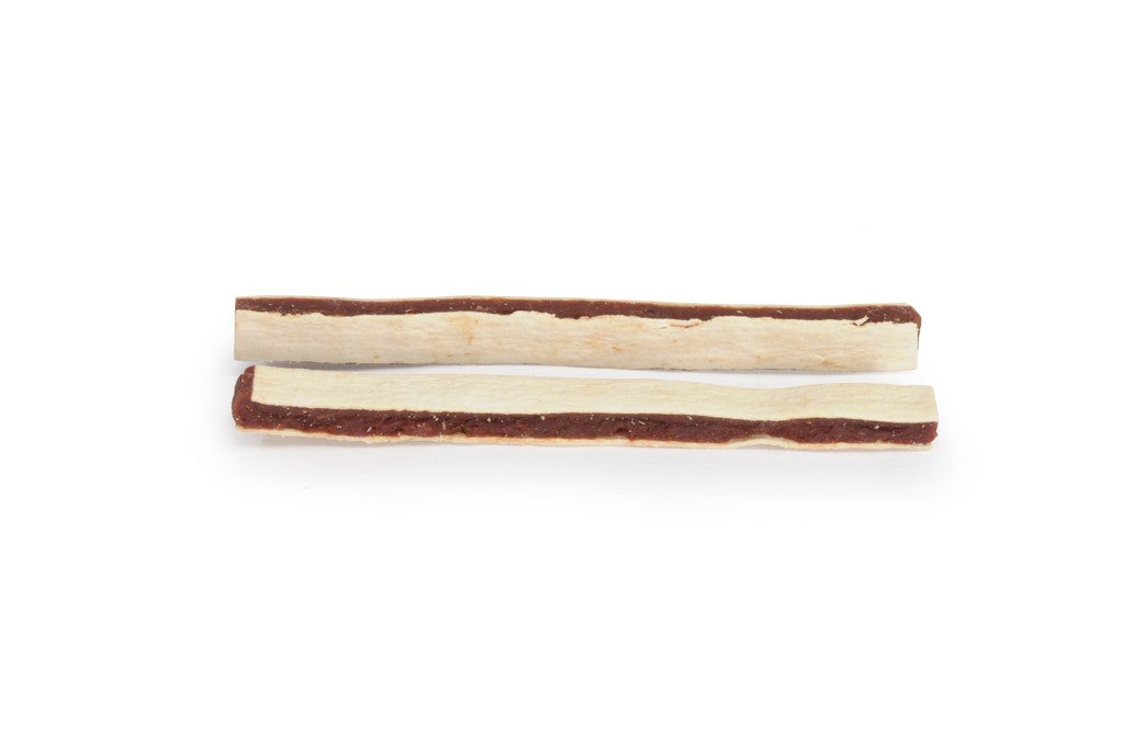 Snack sandwich Camon cavallo e merluzzo, vista laterale che mostra la struttura a tre strati Snack sandwich Camon cavallo e merluzzo, vista laterale che mostra la struttura a tre strati